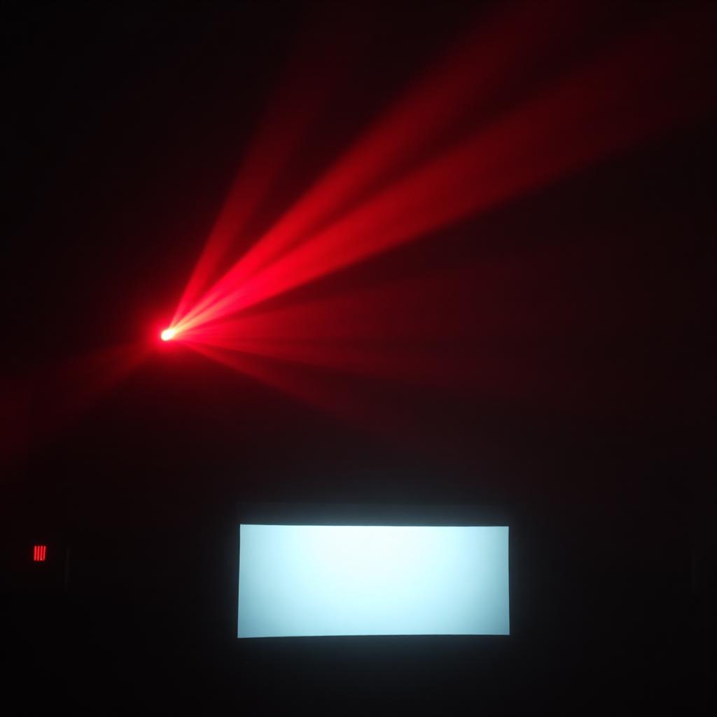 A red projector beam cutting through dust in a dark theater, with a faint glowing screen in the distance